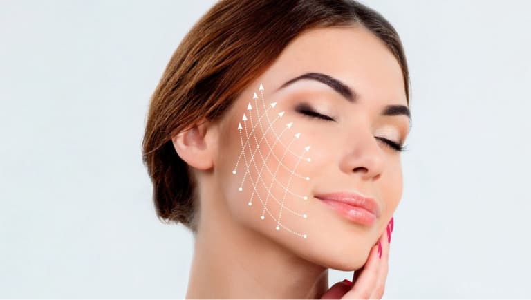 imagem mulher encostando no rosto com linhas circulares na bochecha, emagrecimento facial, procedimento harmonização orofacial
